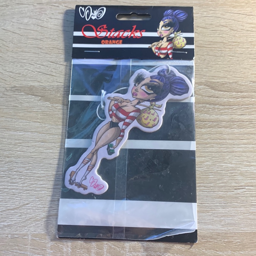 SandOne Stacks air freshener orange scent sand doll